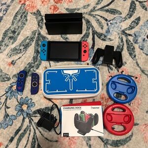 Nintendo Switch with Red and Blue Joy-Cons and Accessories